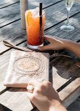 Aloha Tassel Clutch - Light Tan